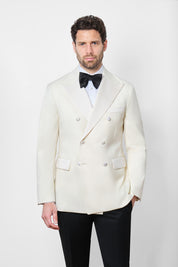 White jacket and black pants tuxedo