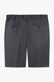 Vue de dos d'un bermuda gris anthracite en lin. Le bermuda dispose d’une ceinture élastique et de poches à l'arrière.