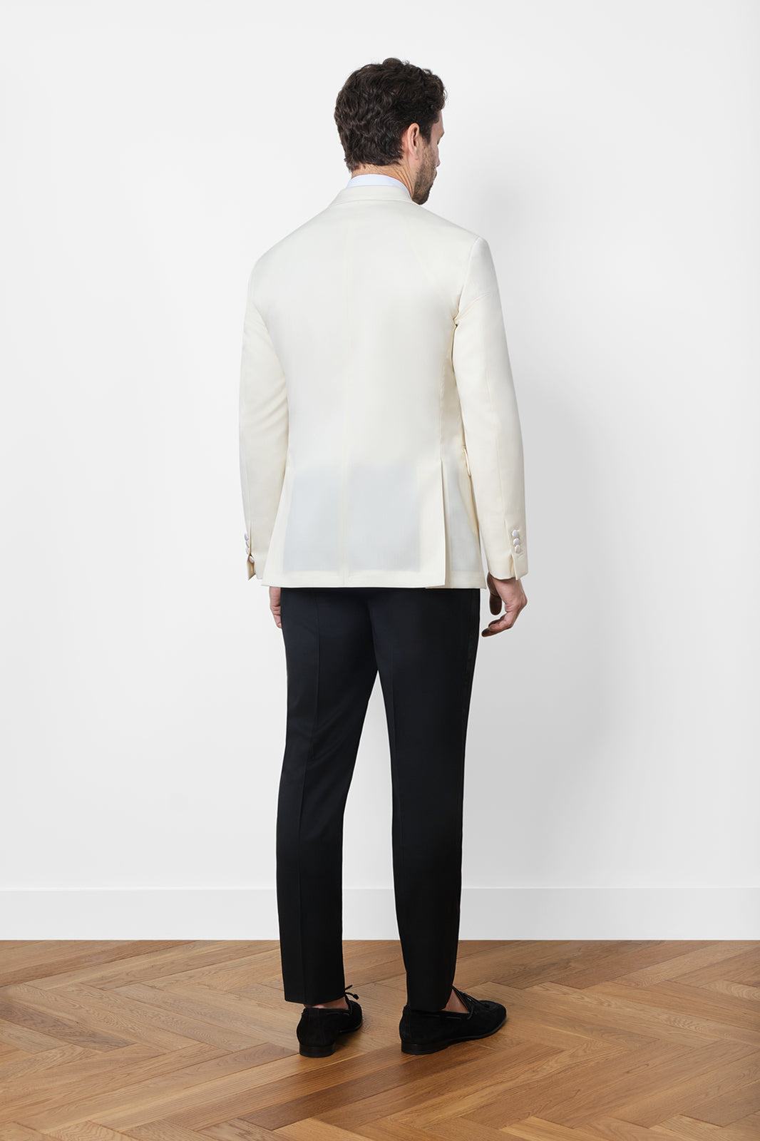 White jacket and black pants tuxedo