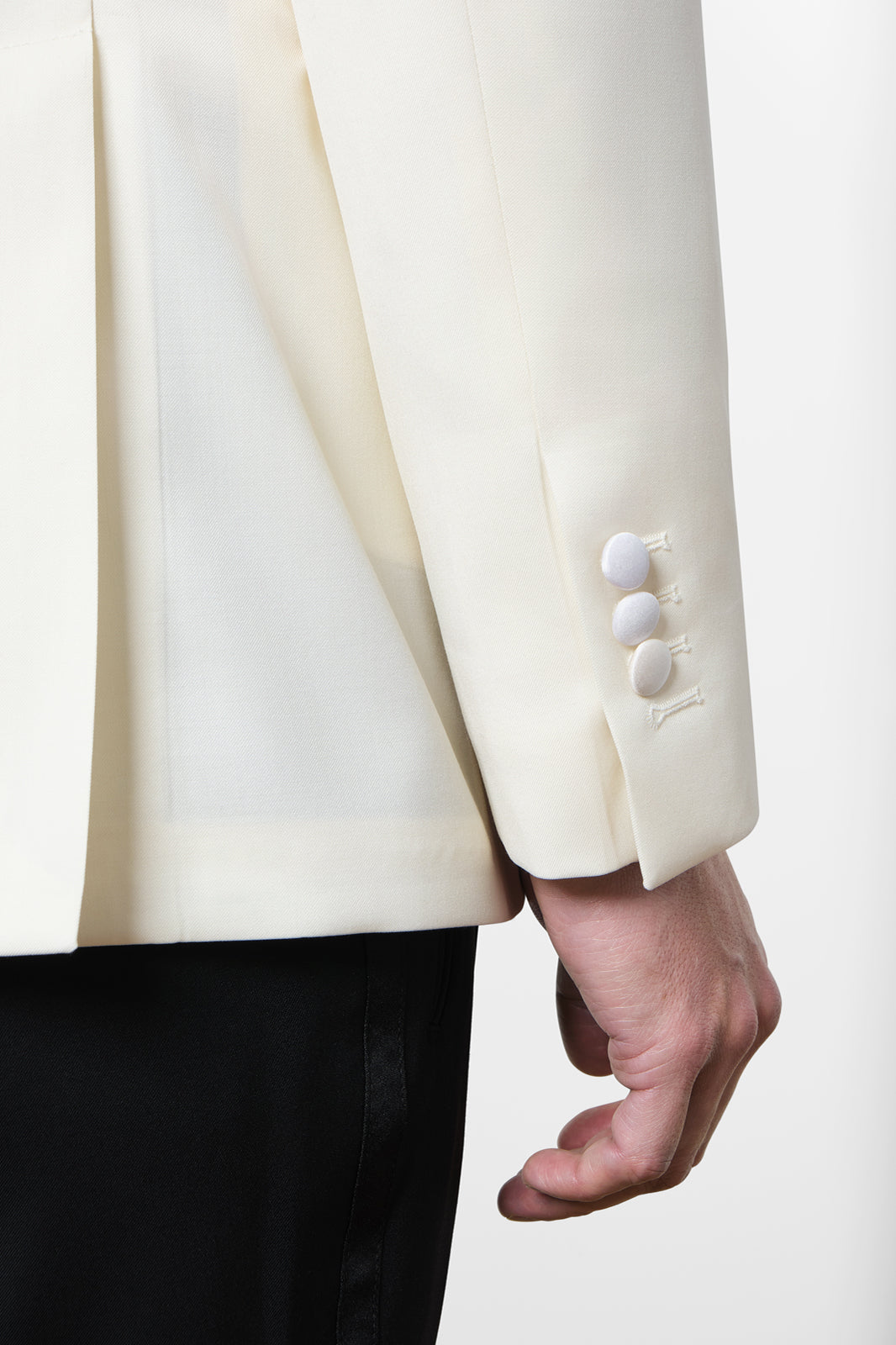 White jacket and black pants tuxedo