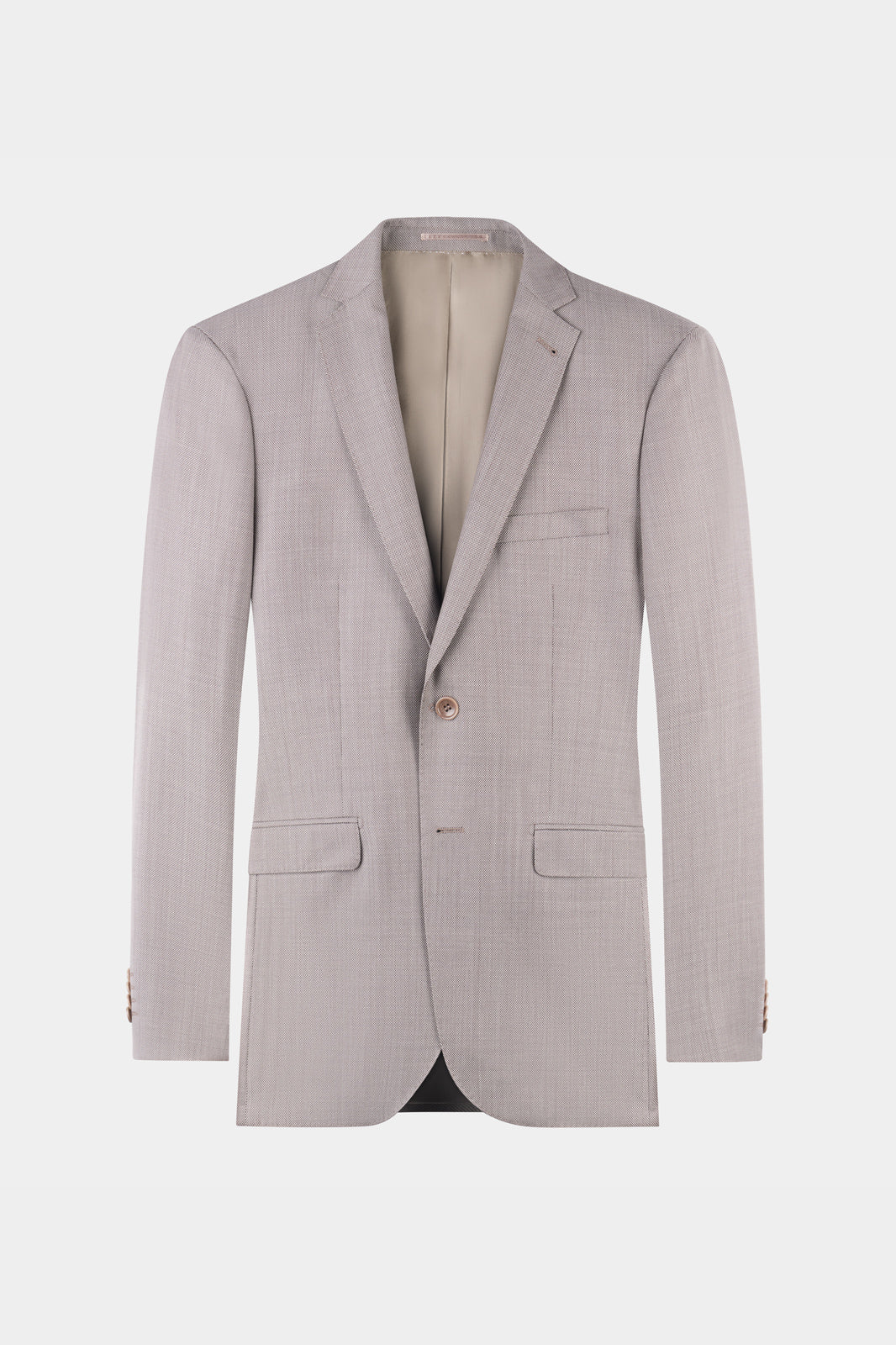 Veste à deux boutons avec des poches à rabat en tissu grain de caviar beige.