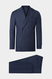 Vue sur fond blanc d'un costume croisé revers flèche non doublé et poche plaquée en 100% laine bleu foncé de chez Vitale Barberis Canonico.