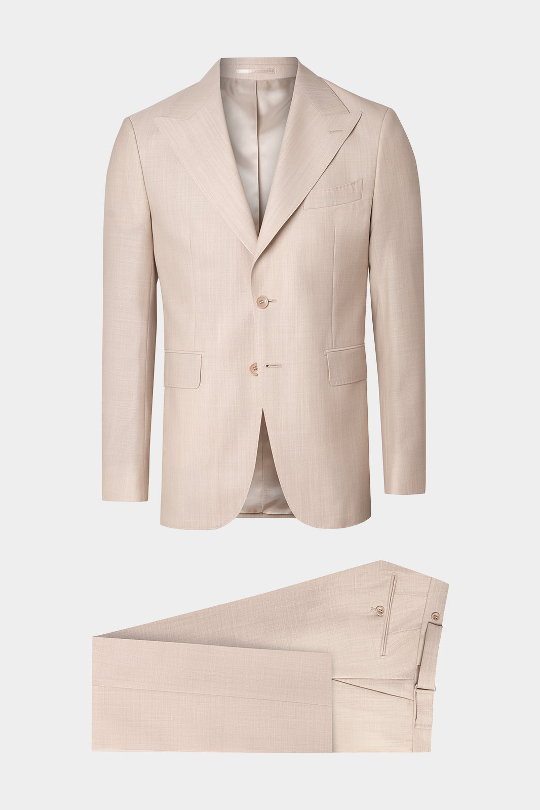 Vue sur fond blanc costume revers flèche et pantalon patte de serrage en beige clair