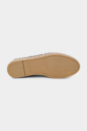 Semelle en corde d'une espadrille en cuir bleu marine.