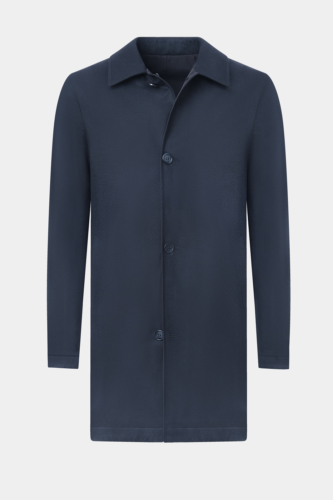 Vue sur fond blanc d'un imperméable réversible en laine et matière technique.
