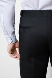 White jacket and black pants tuxedo