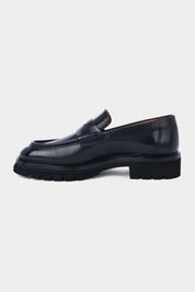 Leather loafers with thick, notched sole - Black