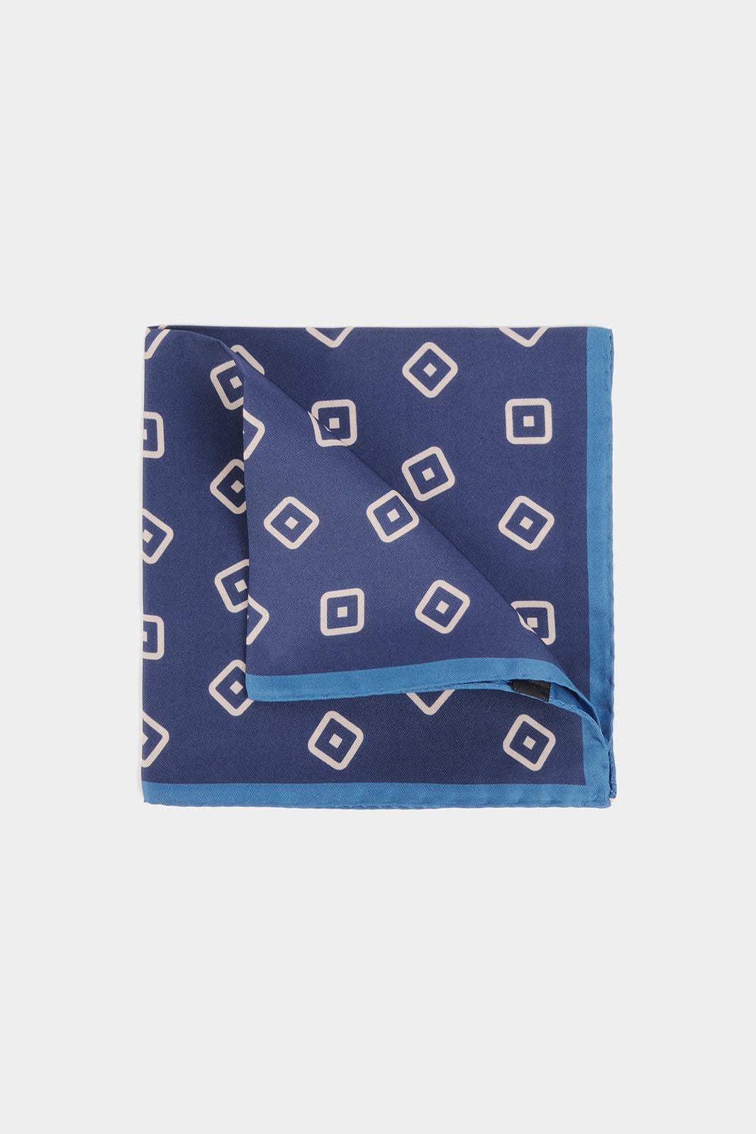 Pochette fond marine à motif carrés beiges