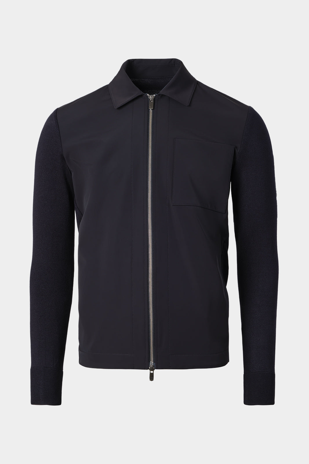 Vue sur fond blanc d'un blouson zippé bi matière en marine