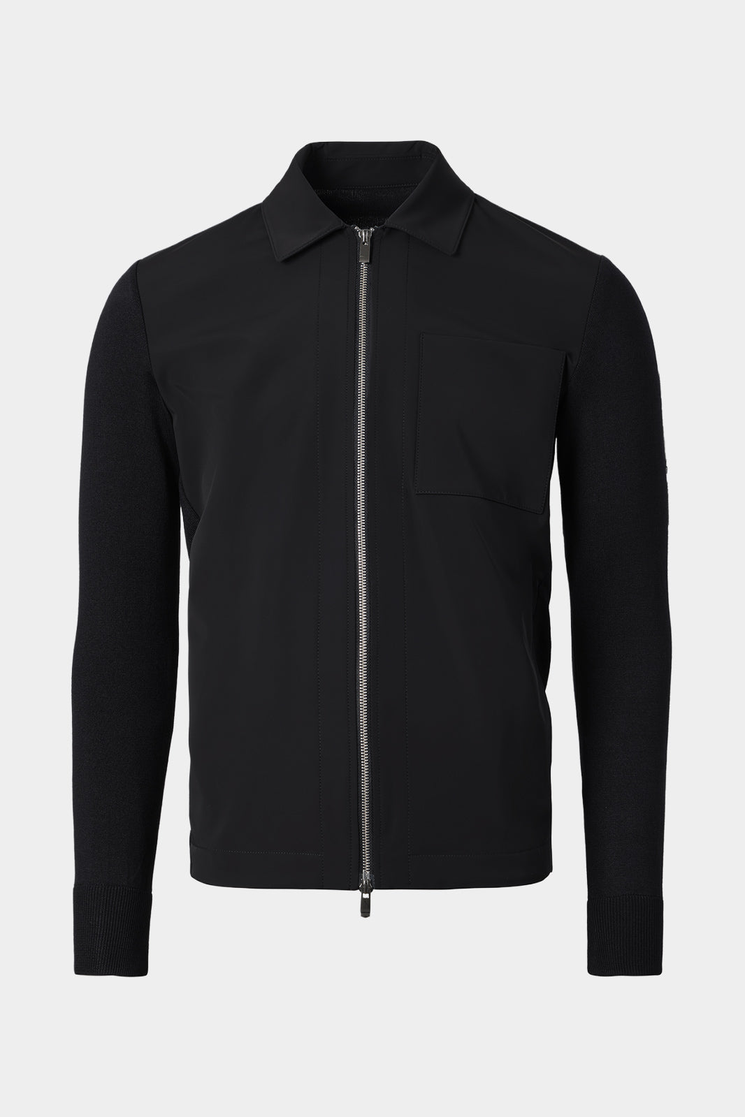 Vue sur fond blanc d'un blouson zippé bi matière en noir