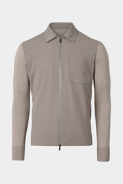 Vue sur fond blanc d'un blouson zippé bi matière en noisette 