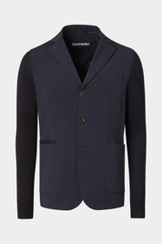 Veste bi-matière à capuche amovible de couleur marine. Tissu italien.