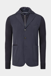 Veste bi-matière à capuche amovible de couleur marine. Tissu italien.