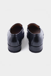 Mocassins en cuir patiné avec semelle compensée et crantée