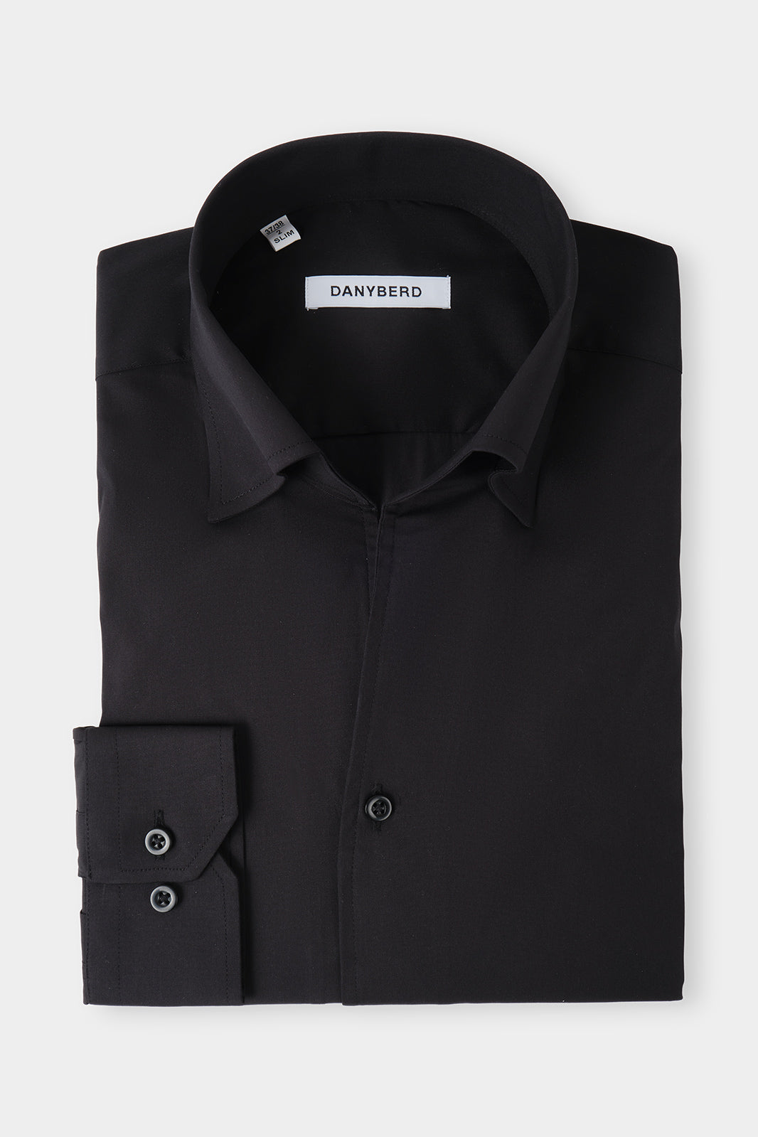 Vue sur fond blanc d'une chemise confort col capri en coton d'Italie, nylon et élasthanne noir