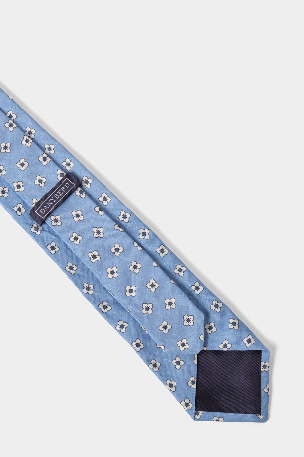 Cravate en soie et lin  –  Bleu clair à motifs fleurs blanches et bleues