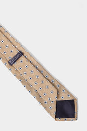 Cravate en soie et lin – Sable à motifs fleurs blanches et bleues