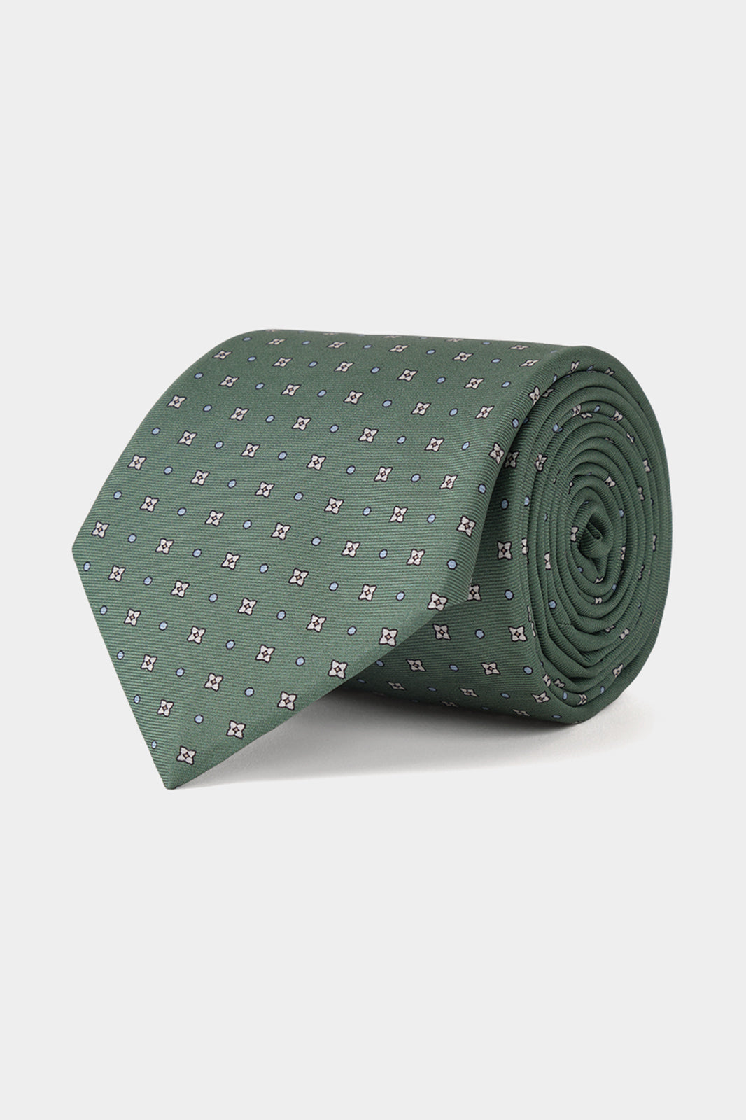 Cravate fabriquée en 100 % soie de couleur vert à motifs fleurs.