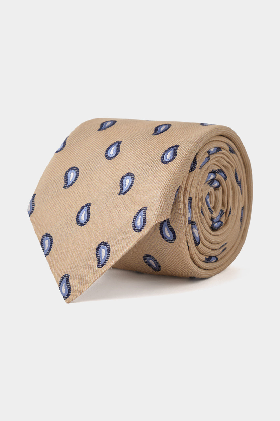 Cravate fabriquée en 100 % soie de couleur beige à motifs gouttes.