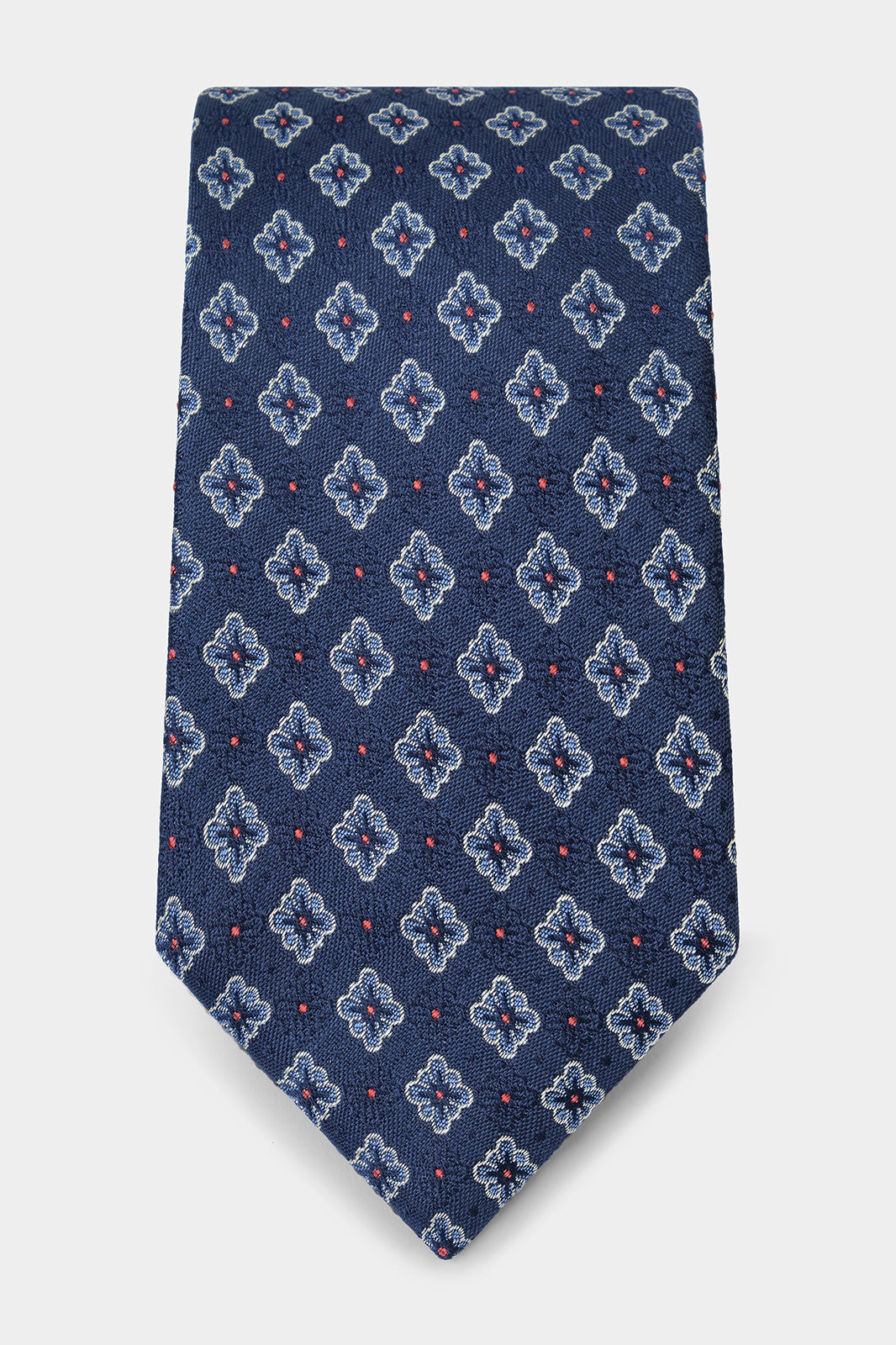 Cravate 100% soie - Marine à motif fleurs bleues et pois rouges