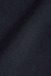 Vue de matière d'un blouson worker en marine en laine, cachemire et polyester.