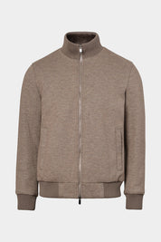 Vue sur fond blanc d'un blouson en jersey de laine fourré synthétique en taupe 