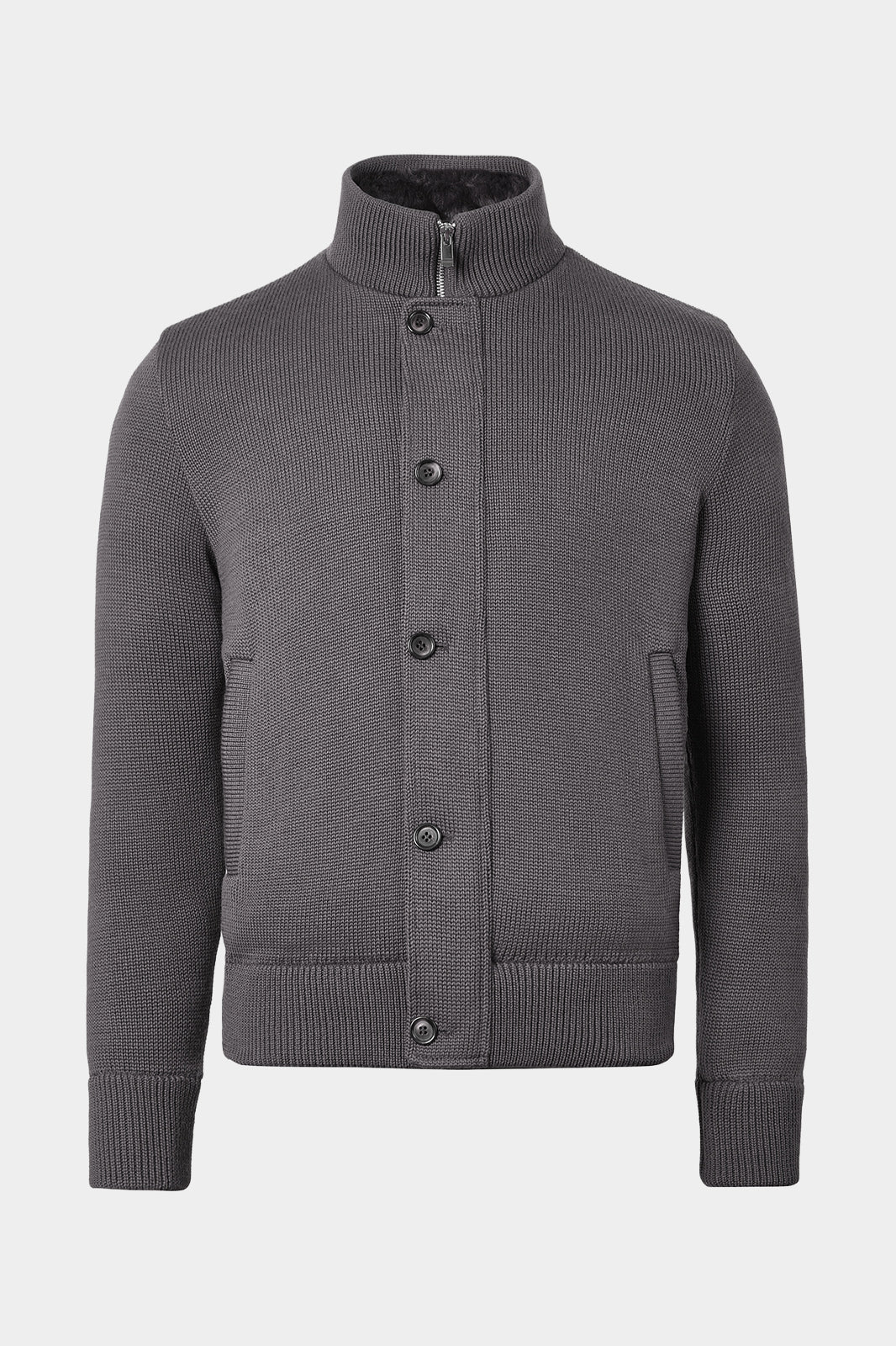 Vue sur fond blanc blouson en maille matelassé en gris