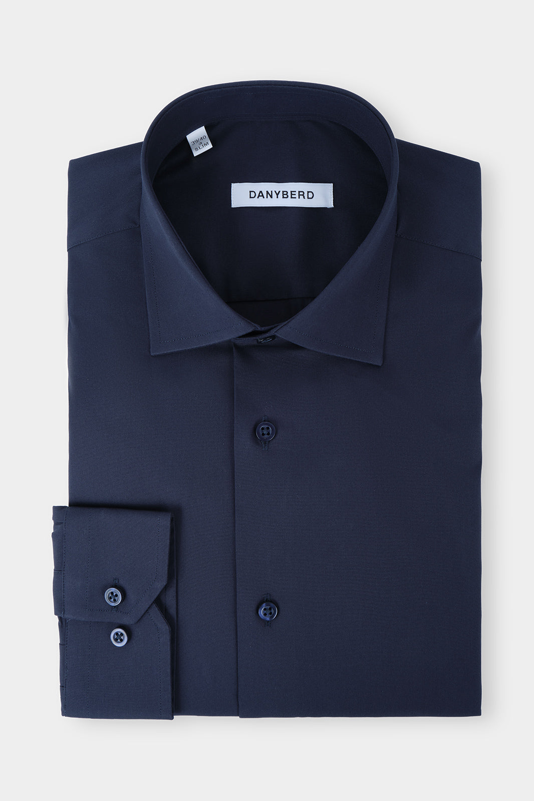 Vue sur fond blanc d'une chemise en col français sur un tissu confort en coton stretch en couleur marine.