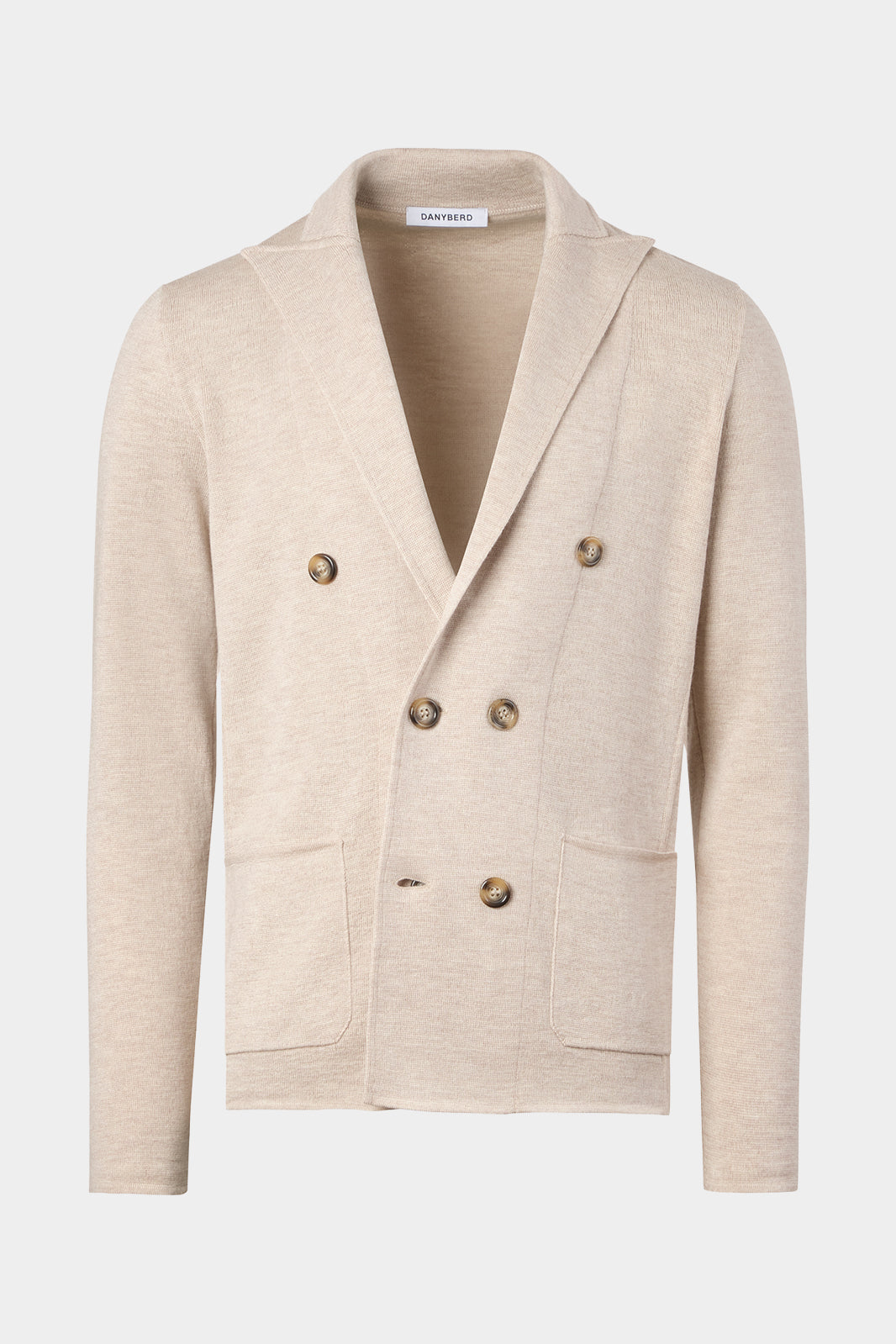 Vue sur fond blanc d'un blazer croisé en beige en 100% laine.