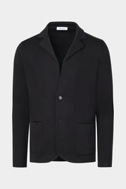 Vue sur fond blanc d'une veste en maille noir 100% laine d'Italie.