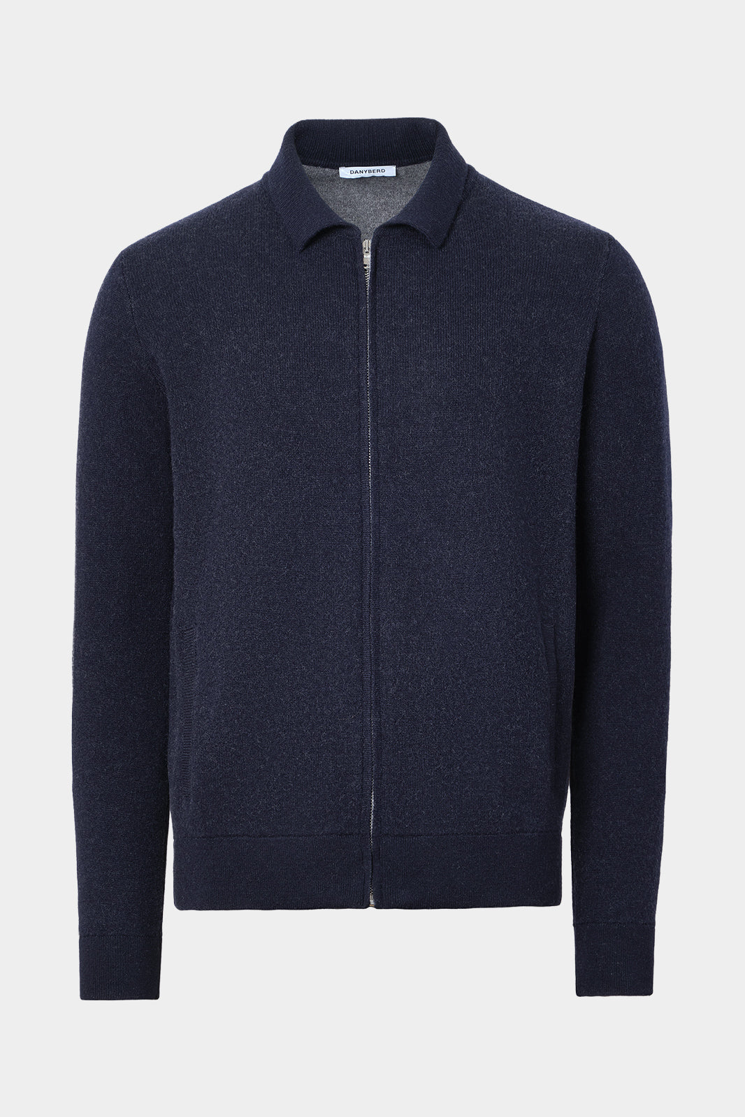Vue sur fond blanc d'un gilet zippé en laine et cachemire marine