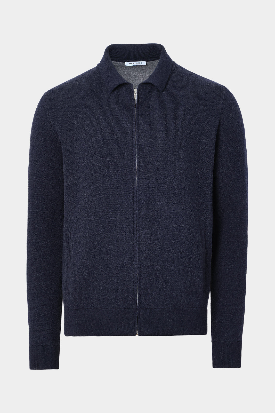 Vue sur fond blanc d'un gilet zippé en laine et cachemire marine
