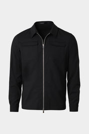 Vue sur fond blanc d'un blouson noir zippé en laine et élasthane.