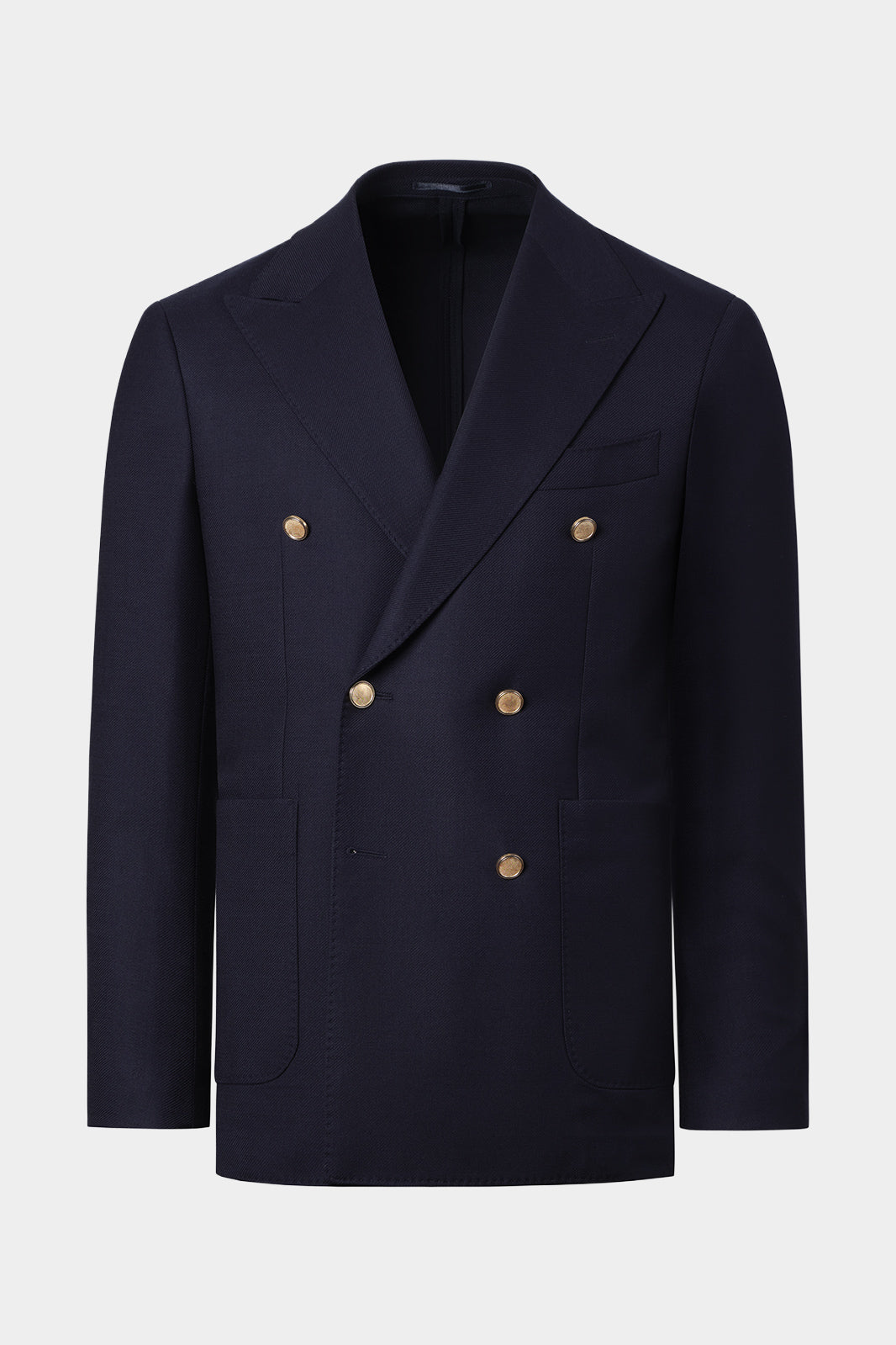 Vue sur fond blanc d'un blazer croisé en laine stretch couleur marine en coupe cintrée. En 98.4% laine et 1.6% élasthanne, sur un tissu italien de chez Reda.