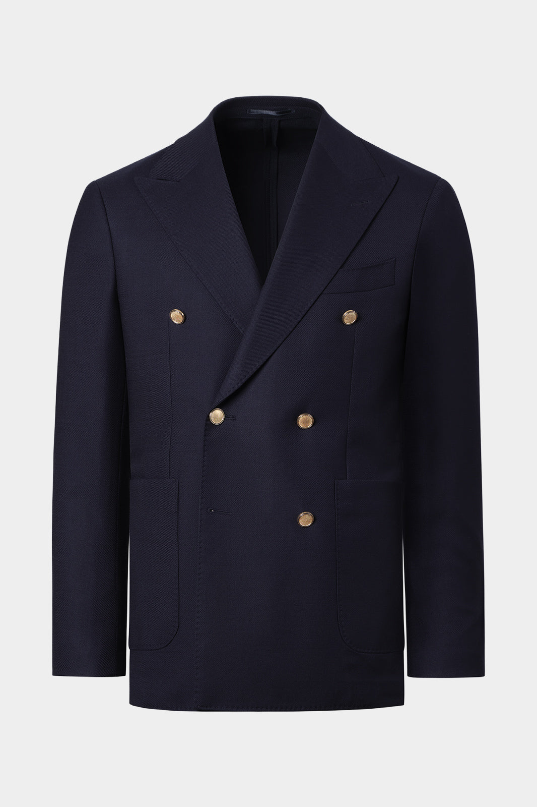 Vue sur fond blanc d'un blazer croisé en laine stretch couleur marine en coupe cintrée. En 98.4% laine et 1.6% élasthanne, sur un tissu italien de chez Reda.