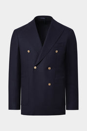 Vue sur fond blanc d'un blazer croisé en laine stretch couleur marine en coupe cintrée. En 98.4% laine et 1.6% élasthanne, sur un tissu italien de chez Reda.