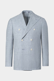 Vue sur fond blanc d'un Blazer croisé Prince de Galles - Bleu, dans un tissu italien 100% laine de chez Vitale Barberis Canonico.