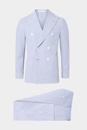 Cette veste croisée en coton est l'incarnation de l'élégance intemporelle. Sa coupe ajustée et sa fermeture à double boutonnage apportent une touche de sophistication à votre silhouette.