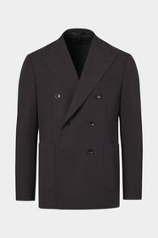 Vue sur fond blanc d'une veste de costume croisé Bon couleur uni noir.