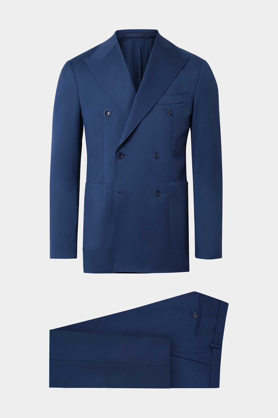 Vue sur fond blanc d'un costume croisé revers flèche non doublé et poche plaquée en 100% laine bleu de chez Vitale Barberis Canonico.