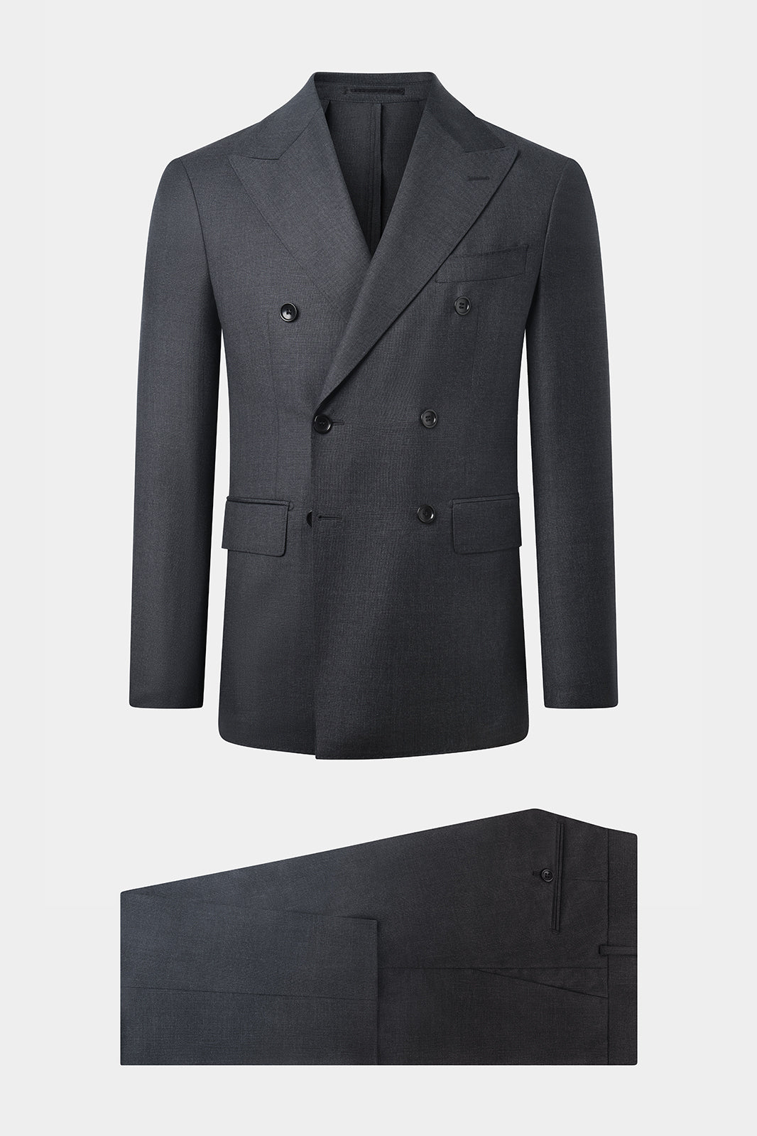 Vue sur fond blanc d'un costume croisé revers pointe sur un montage napolitain en gris anthracite, imprimé prince de galles sur un tissu de chez Vitale Barberis Canonico