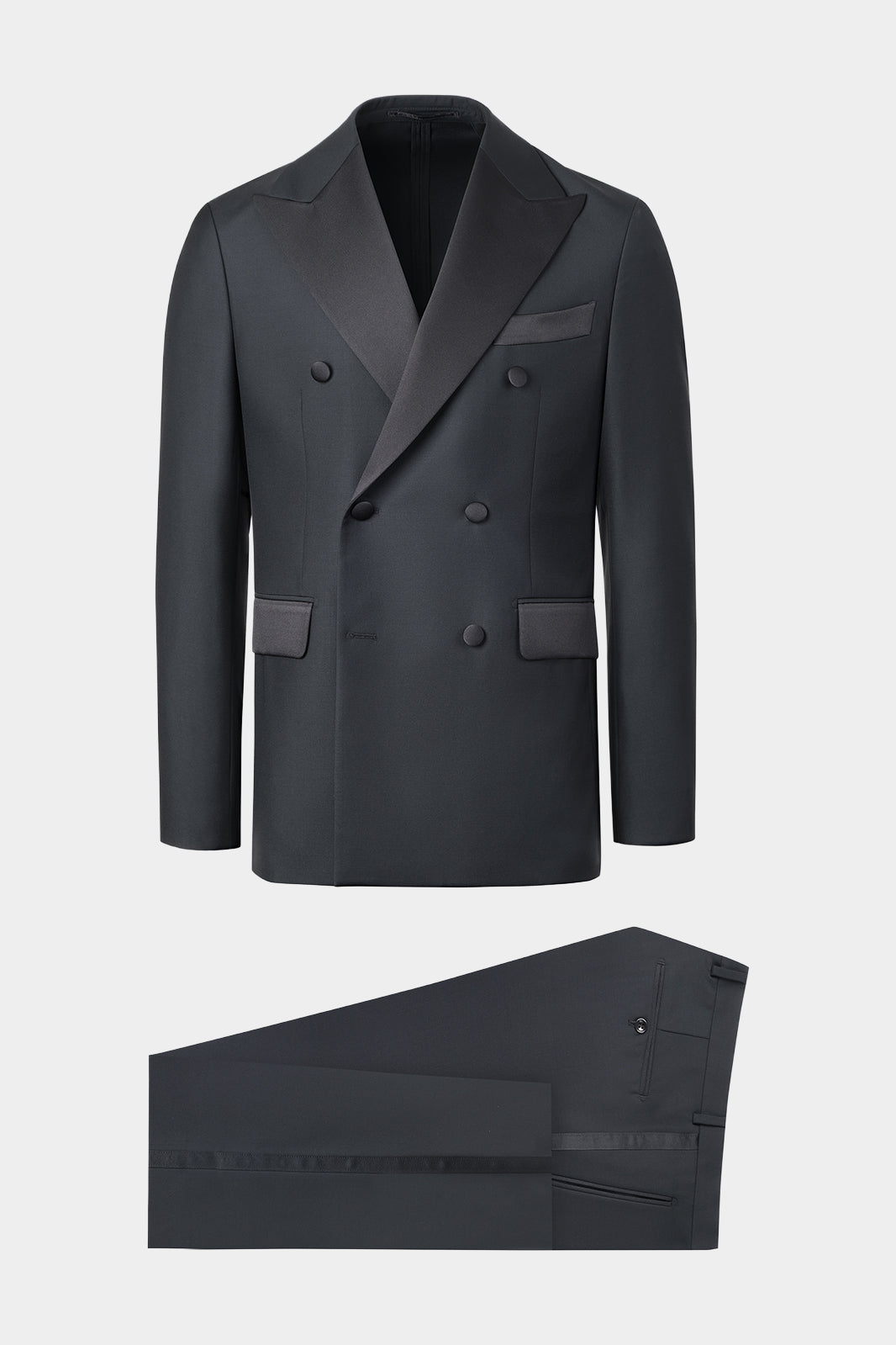 Vue sur fond blanc d'un smoking croisé noir en laine de chez Canonico pour Hommes.