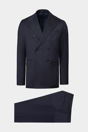 Vue sur fond blanc d'un costume croisé et pantalon patte de serrage de couleur marine. Tissu italien en 90% laine 10% soie de chez Vitale Barberis Canonico.