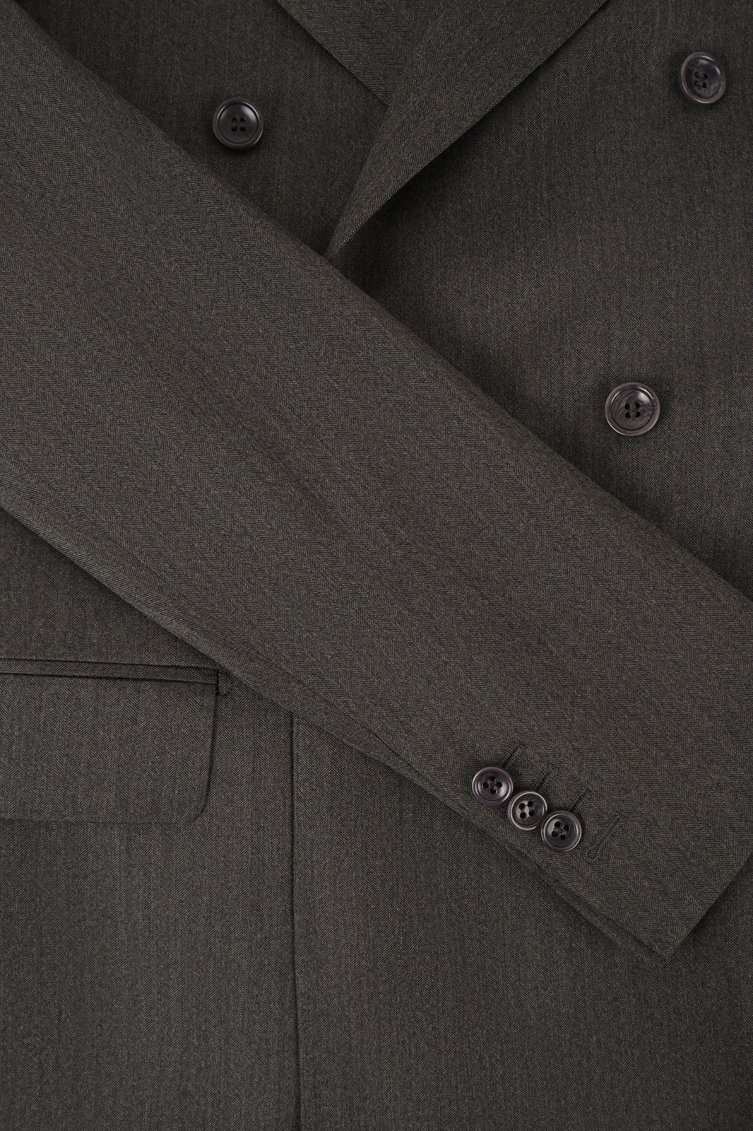 Double-breasted suit and trousers with adjustable tabs and a herringbone weave - Dark green