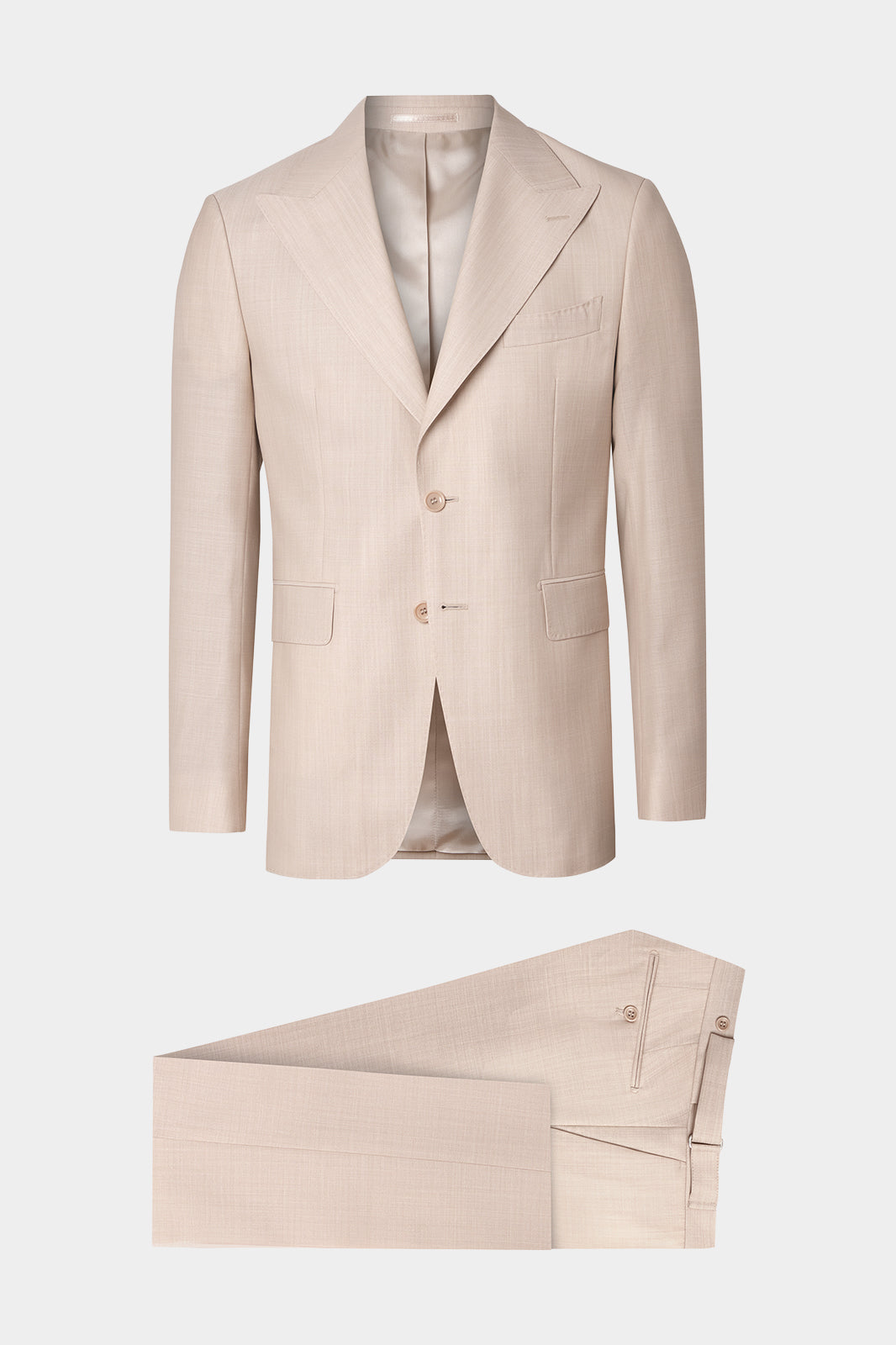 Vue sur fond blanc costume revers flèche et pantalon patte de serrage en beige clair