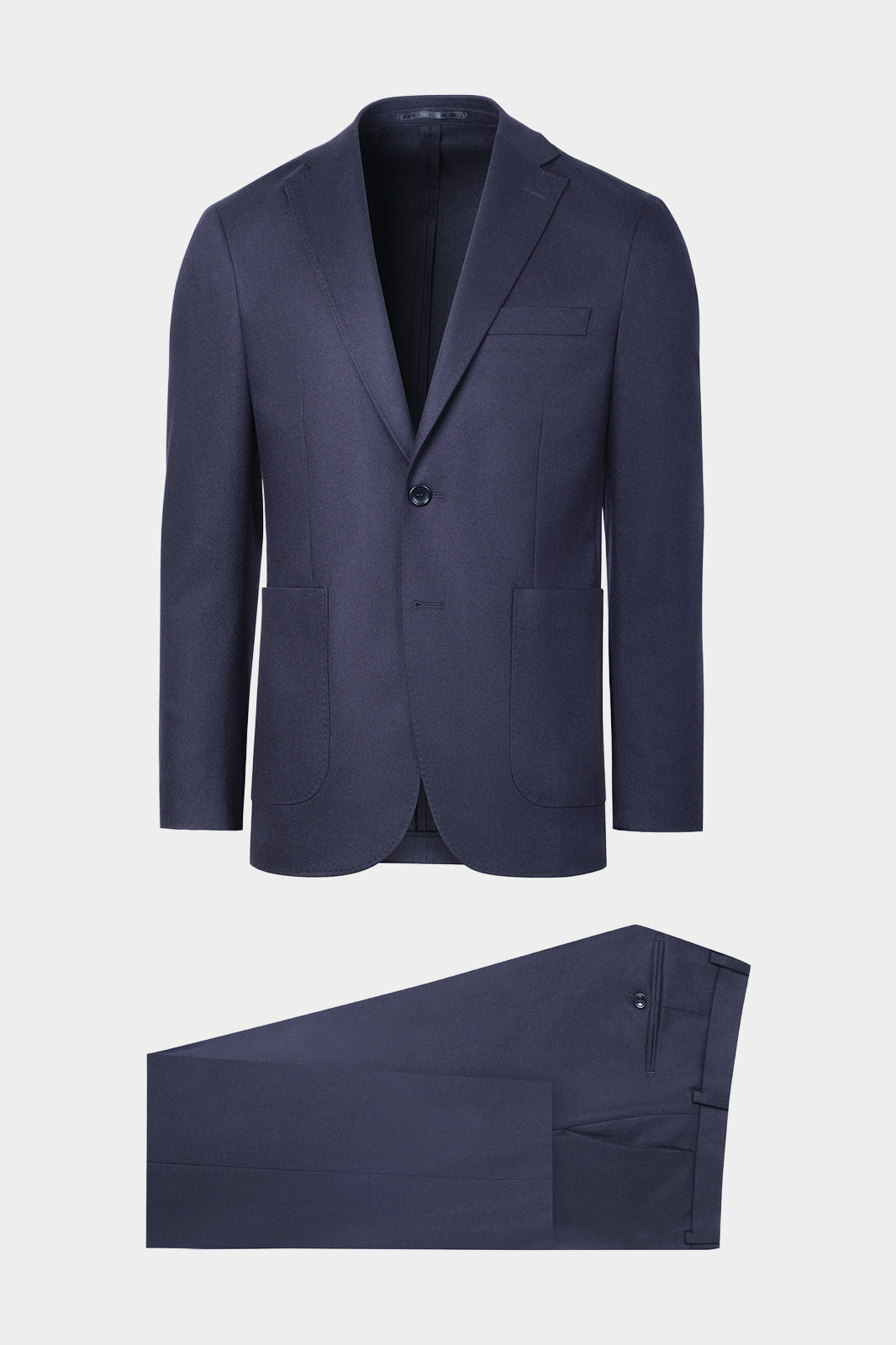 Vue sur fond blanc d'un costume marine poche plaquée couleur marine en laine et élasthane sur un tissu de chez Vitale Barberis Canonico en super 120's