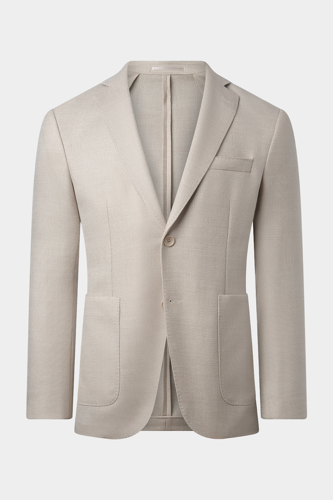 Vue sur fond blanc d'un blazer ou veste seule beige en coupe napolitaine poche plaquée et ajustée sur un tissu natté en 100% laine de chez Ermenegildo ZEGNA