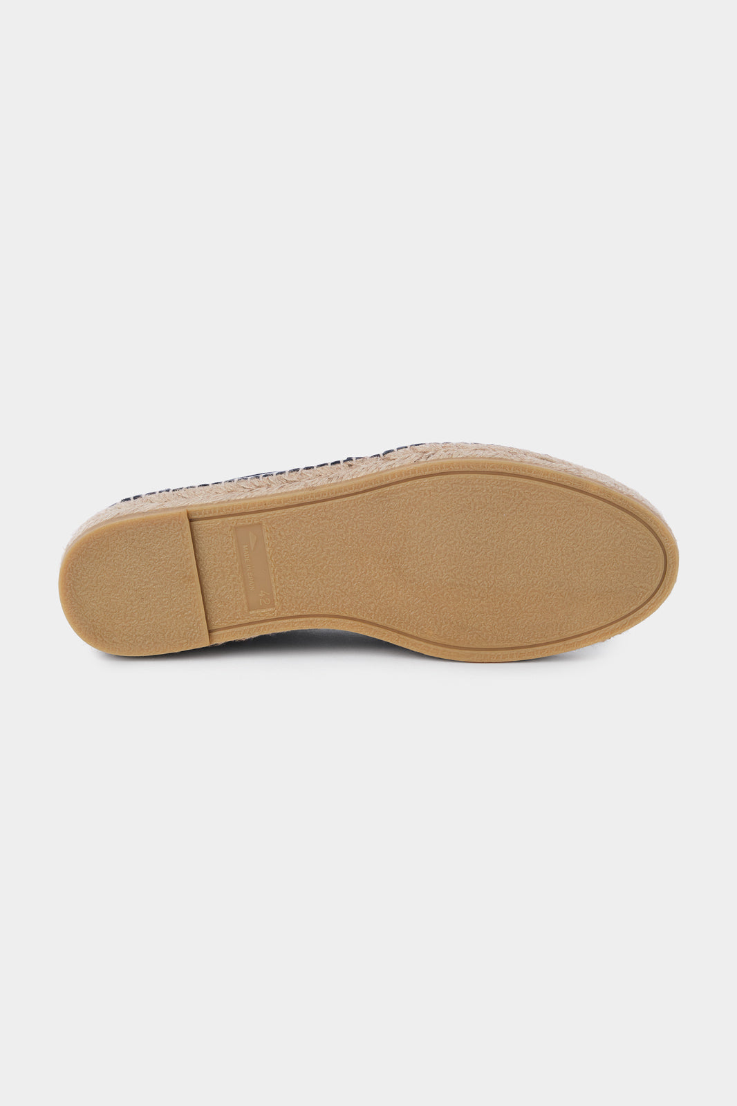  Semelle en corde d'une espadrille en cuir bleu marine.