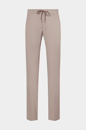 Vue sur fond blanc d'un pantalon jogpant en tissu technique de chez Olmetex taupe avec poches zippés et cordons de serrage.