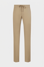 Vue sur fond blanc d'un pantalon jogpant technique poches zippées en Beige